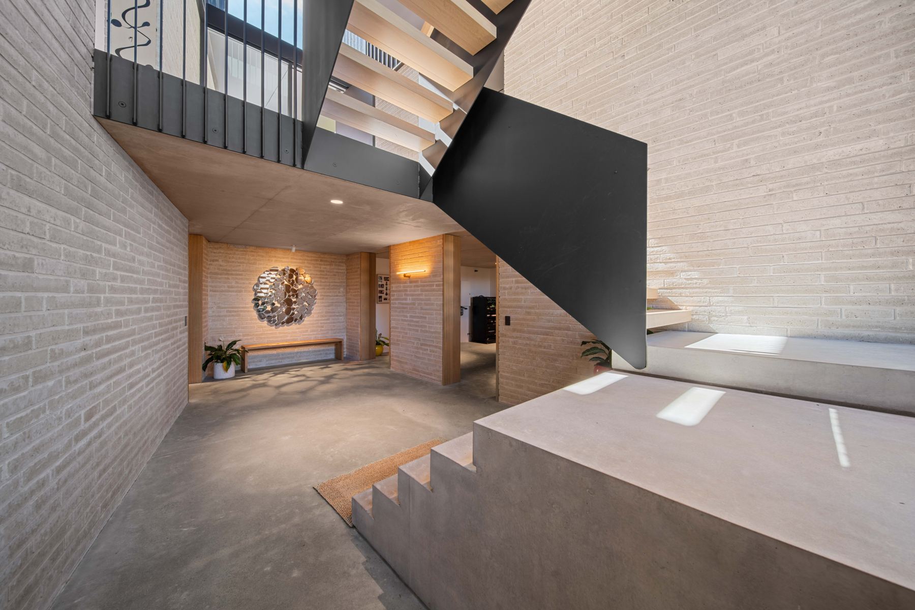Entry with feature wall lighting