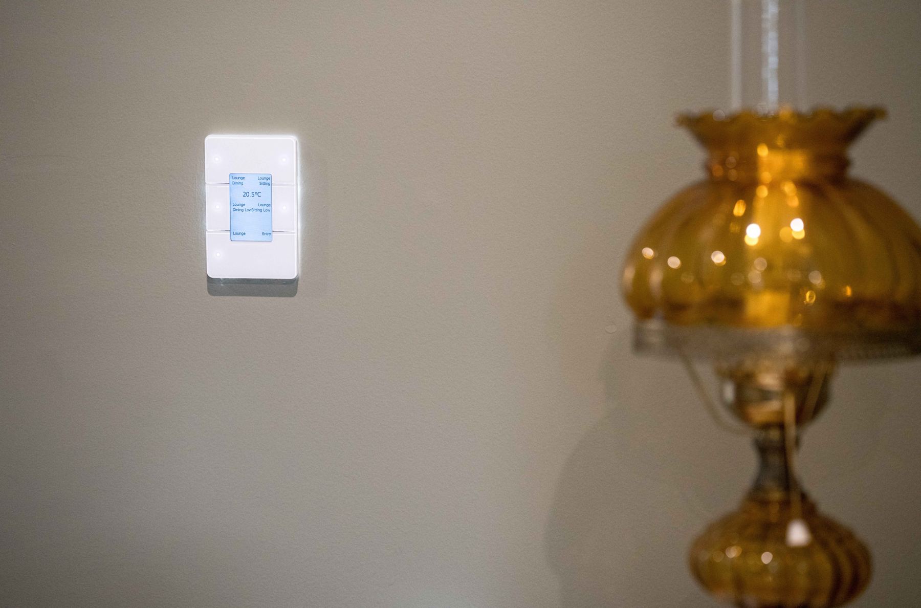 Dynalite display keypad showing 20.5°C and lounge scenes