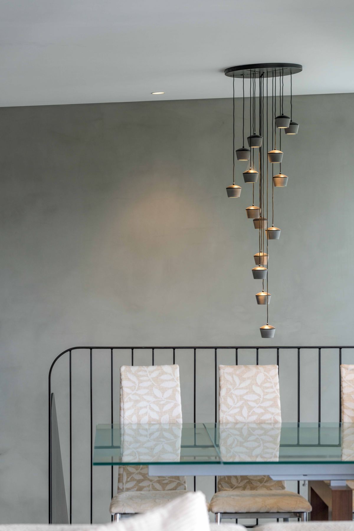Cascading pendant over dining